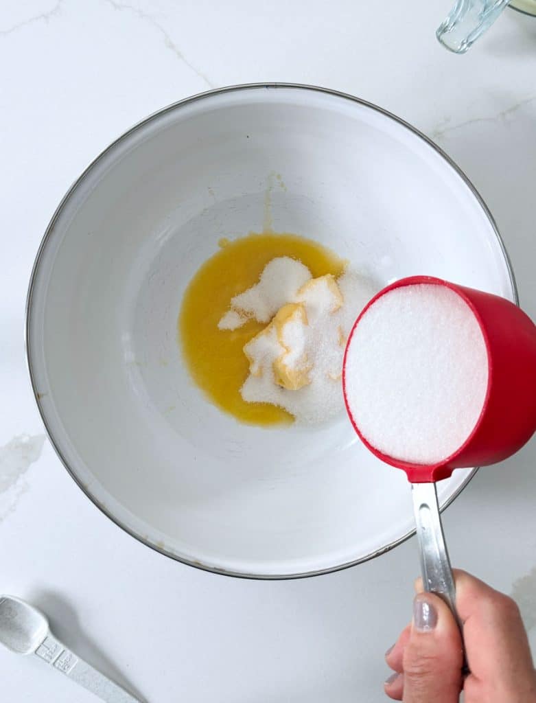 butter and sugar in a white bowl