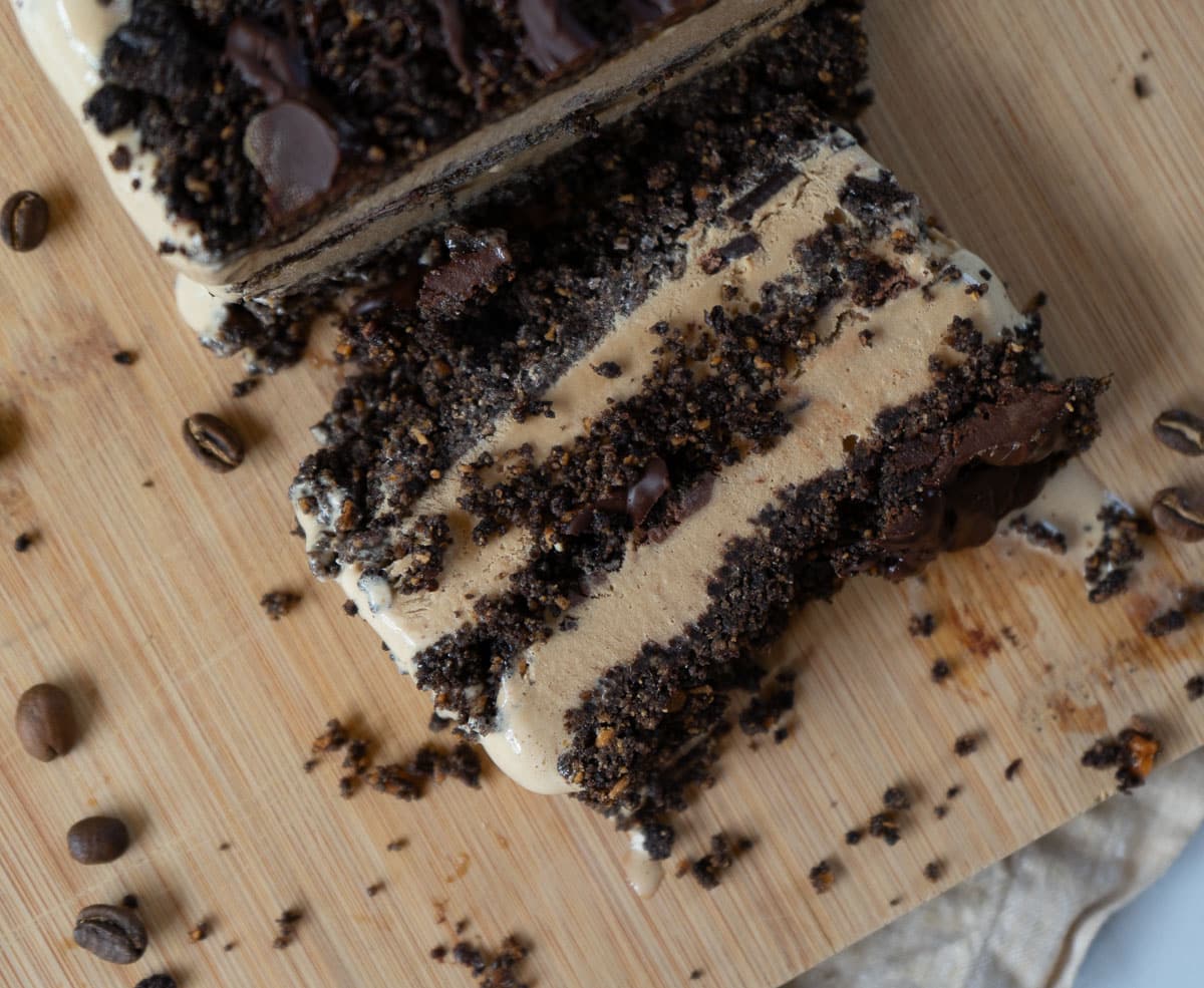 slice of coffee ice cream dessert on a wood plank