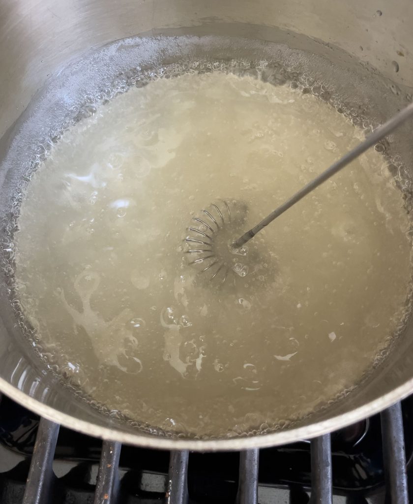 thickened sugar syrup in a saucepan