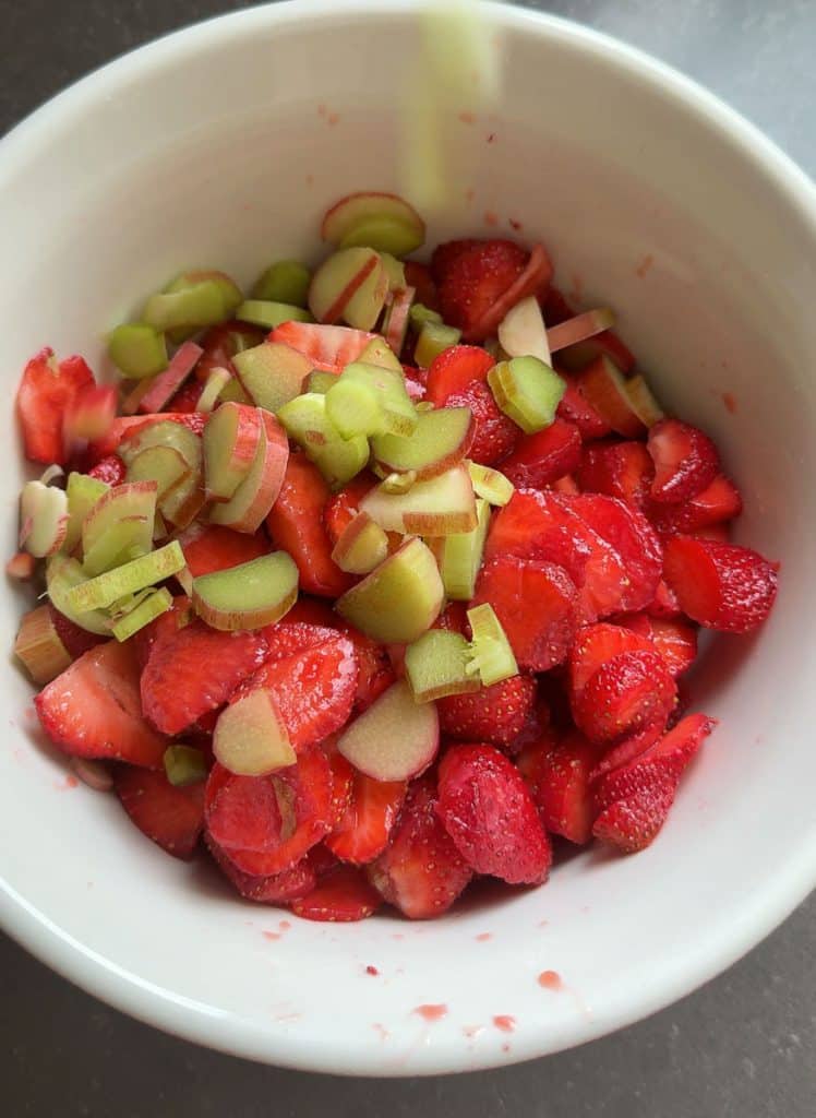 bowl of cut fruit strawberries and rhubarb