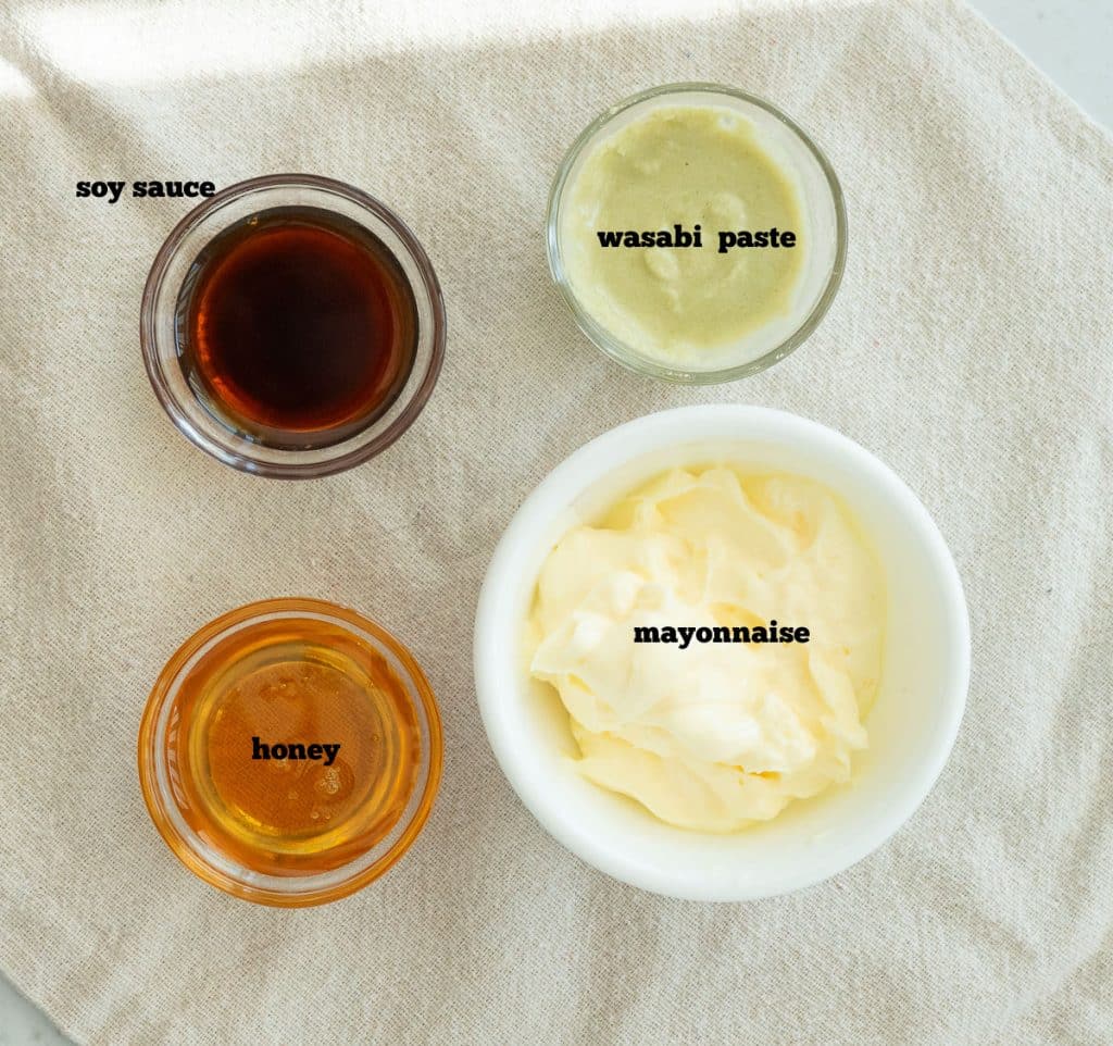 ingredients for wasabi mayo on a tan linen cloth