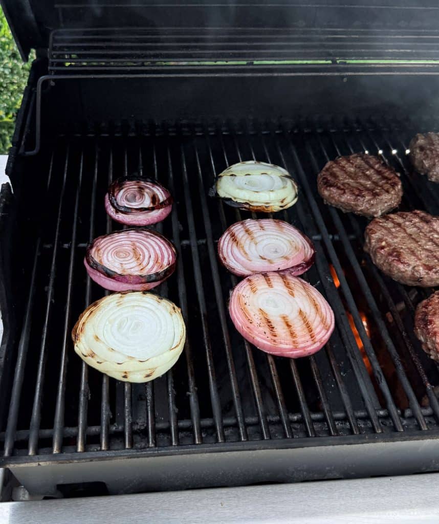grilling onions on an outdoor grill