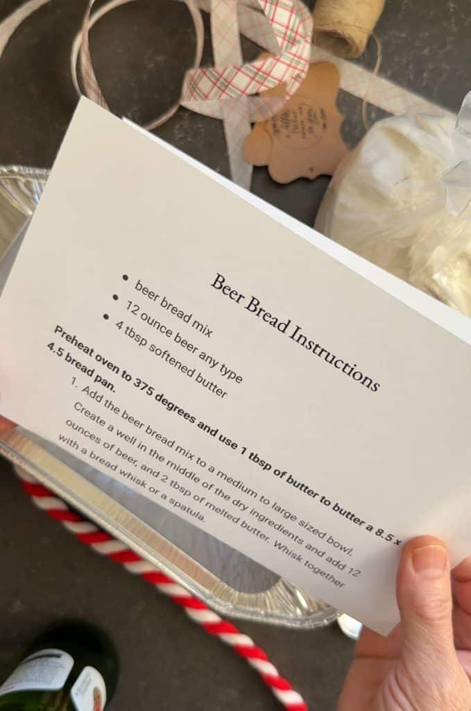 hand holding instructions for beer bread