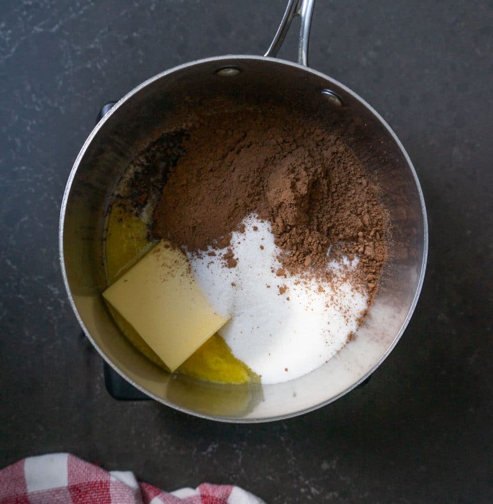 butter, sugar, and cocoa powder in a 3 quart sauce pan
