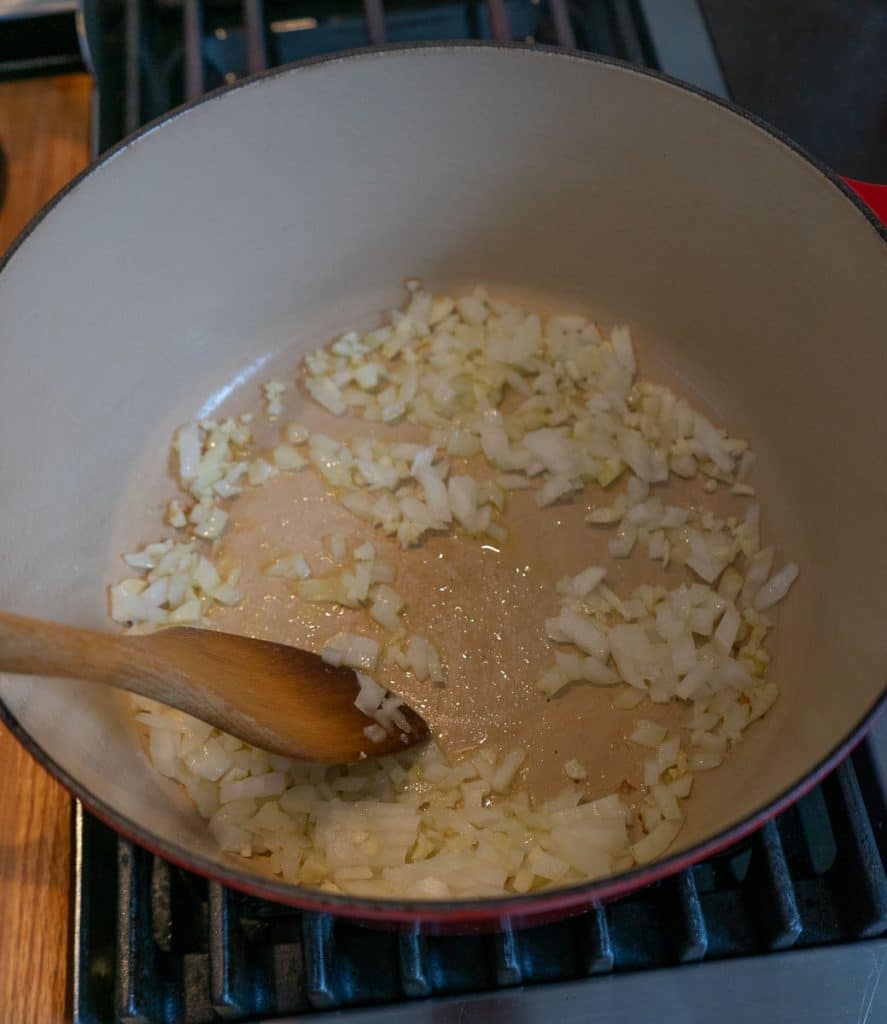 sauteing onion and garlic in dutch oven on the stove top