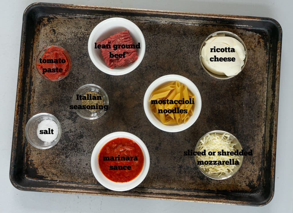 ingredients for mostaccioli on a baking sheet