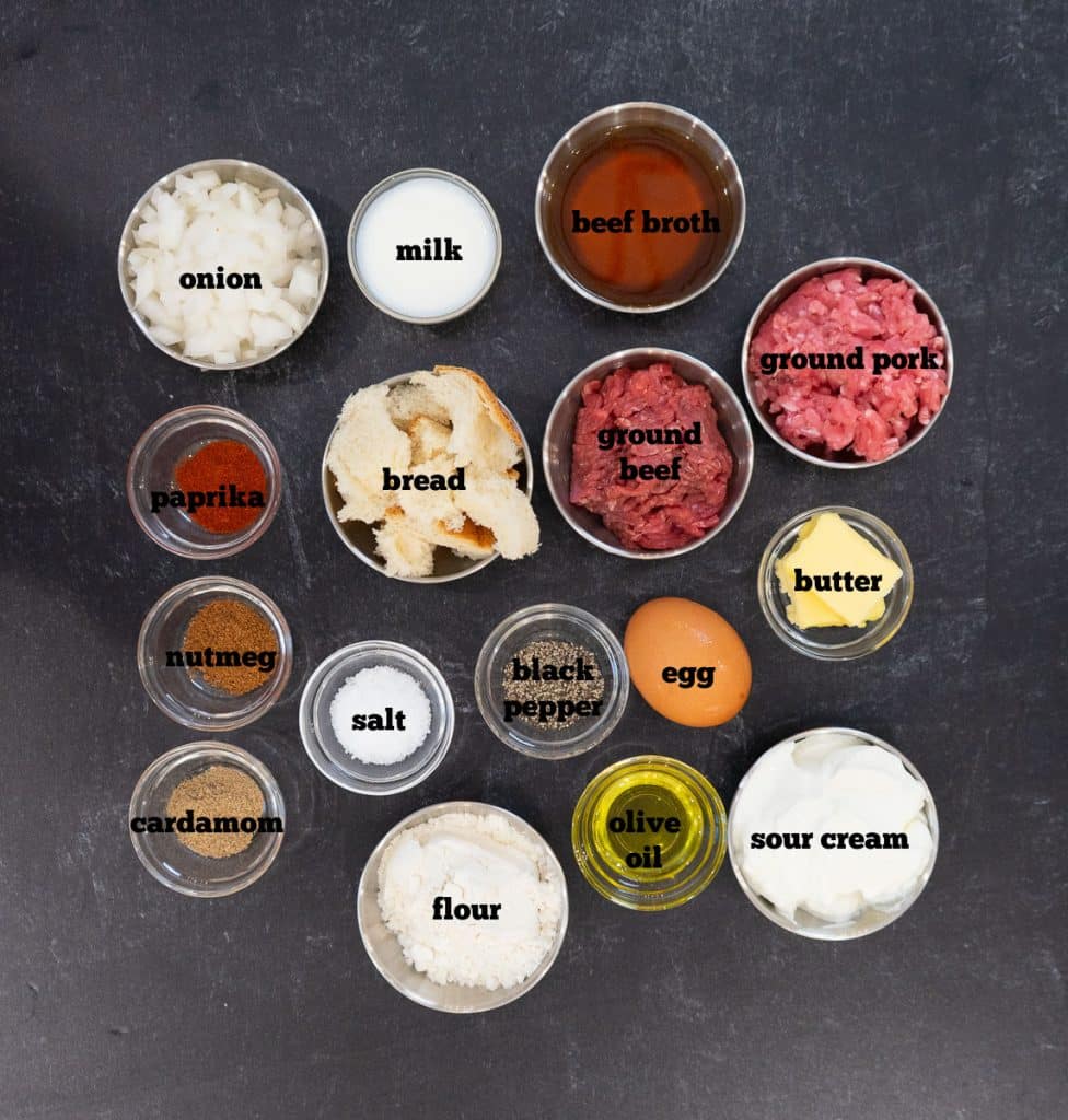 ingredients for swedish meatballs on a black marble countertop