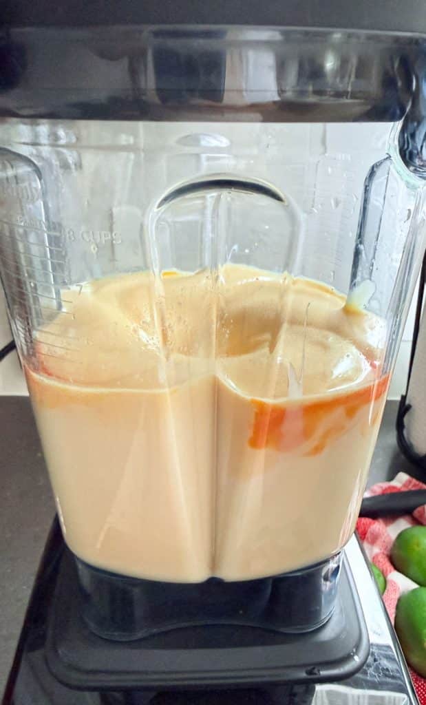 key lime filling  being blended in the pitcher of a blender