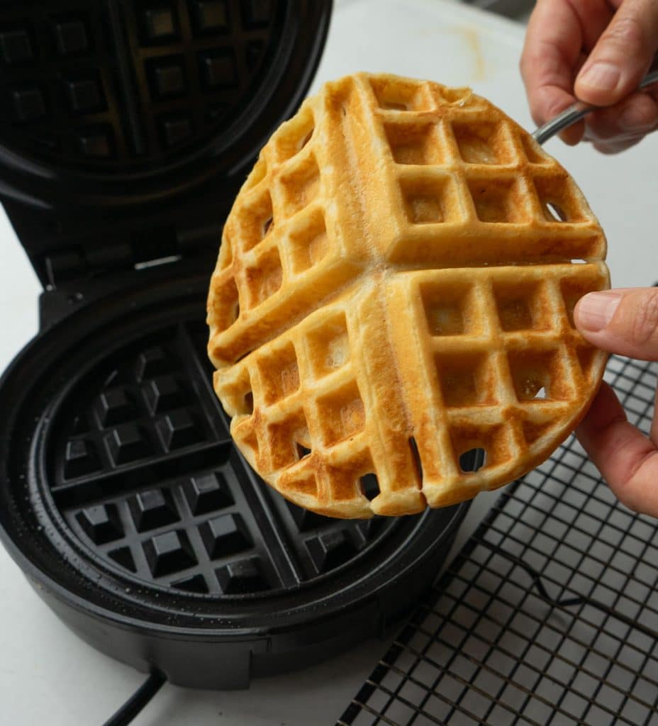 removing waffle from waffle iron with a fork