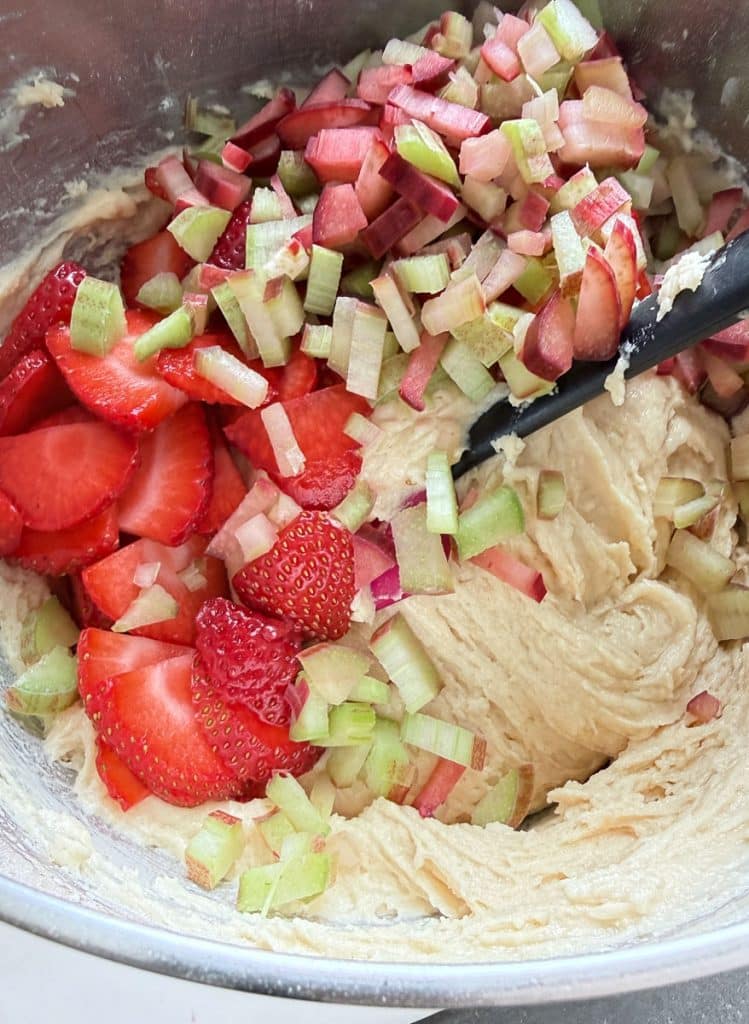 strawberries and rhubarb in batter before it's been mixed in
