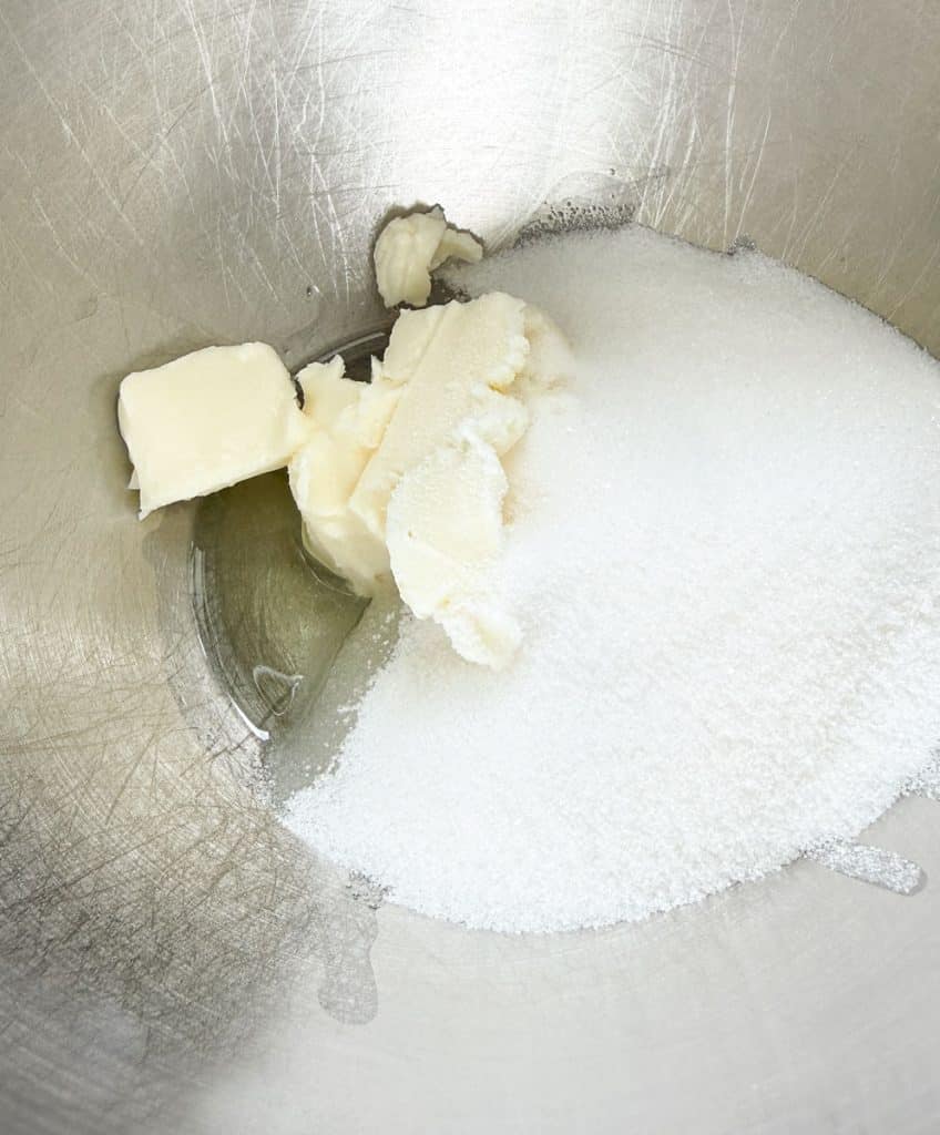 butter oil and sugar in mixing bowl