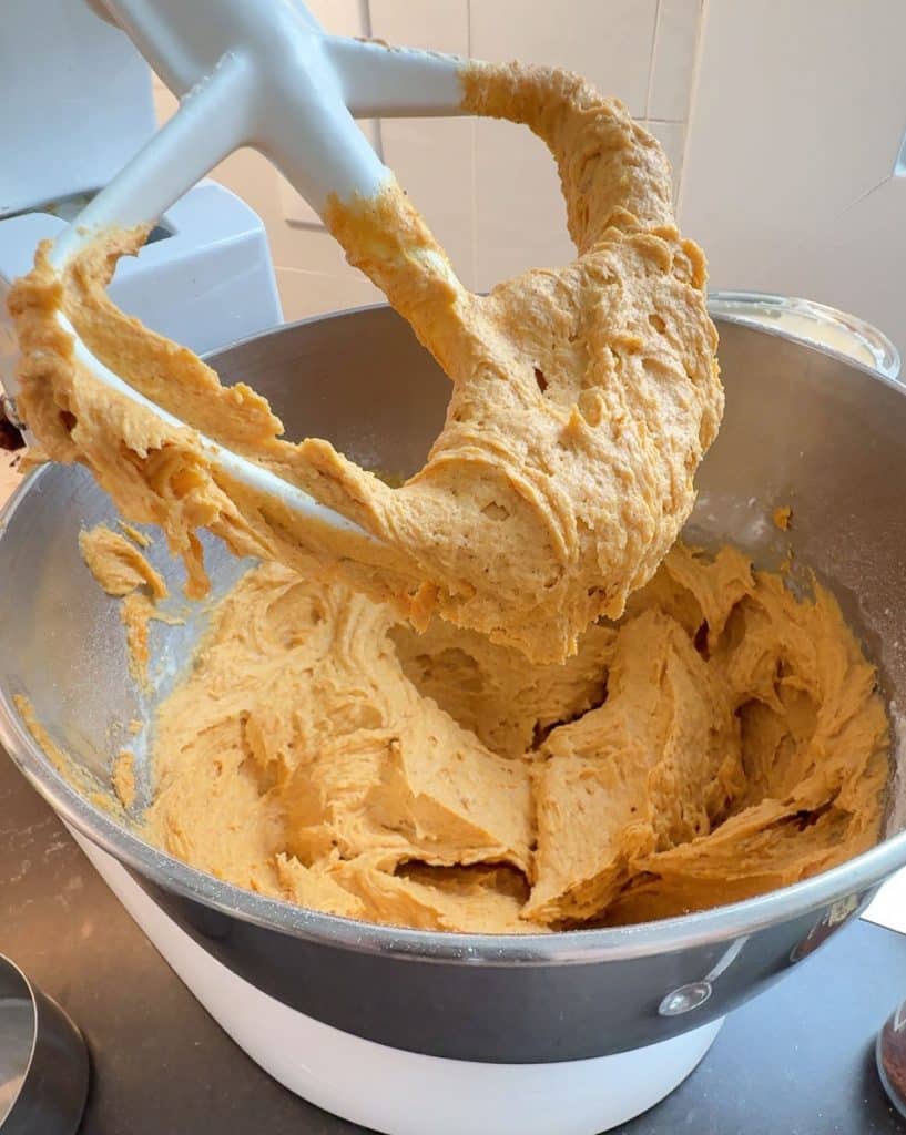 pumpkin spice cookie batter in mixing bowl 