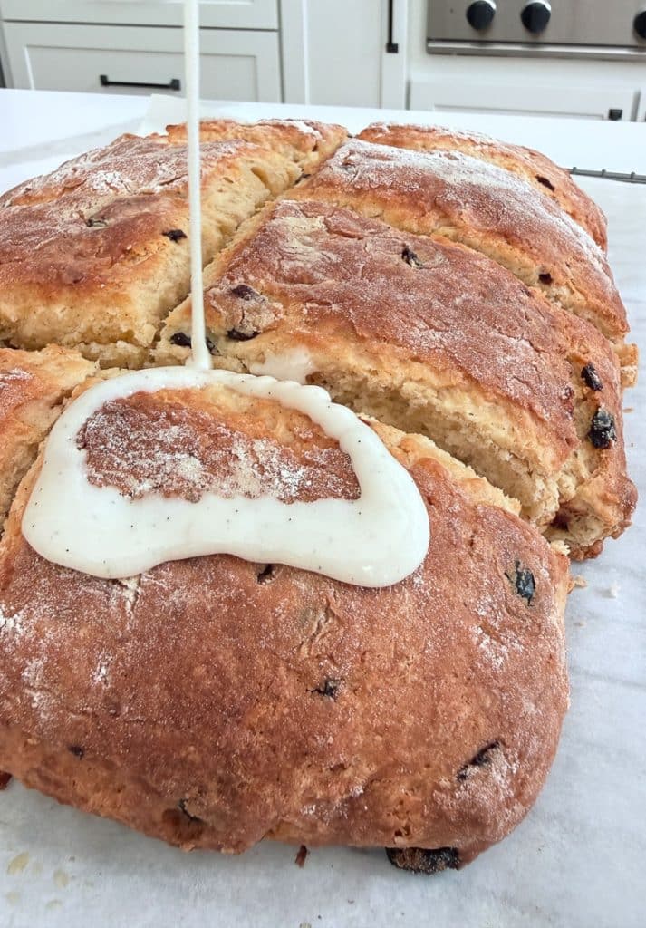 drizzling vanilla bean glaze over scones