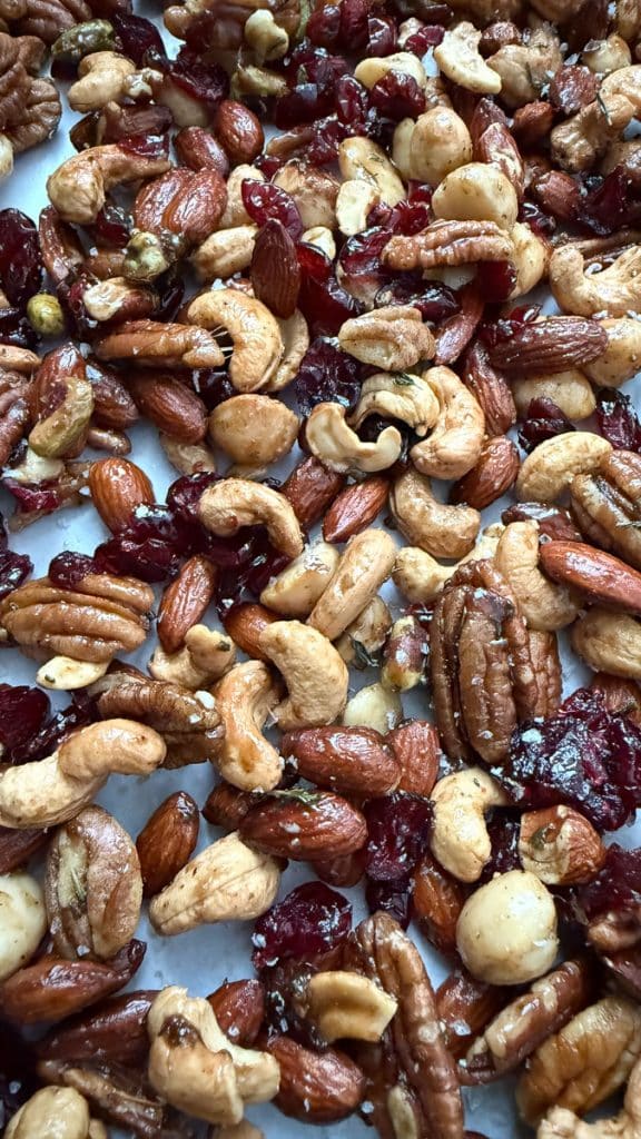 savory nuts on a sheet pan cooling