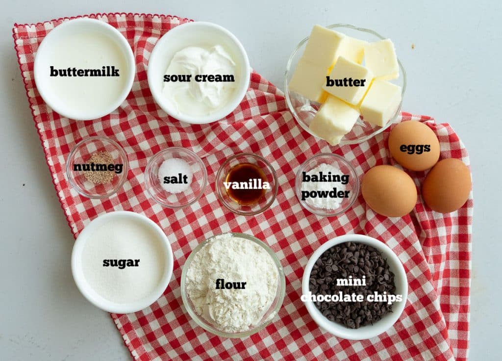 IMG_3948 ingredients for chocolate chip muffins on a red and white gingham cloth on a white countertop