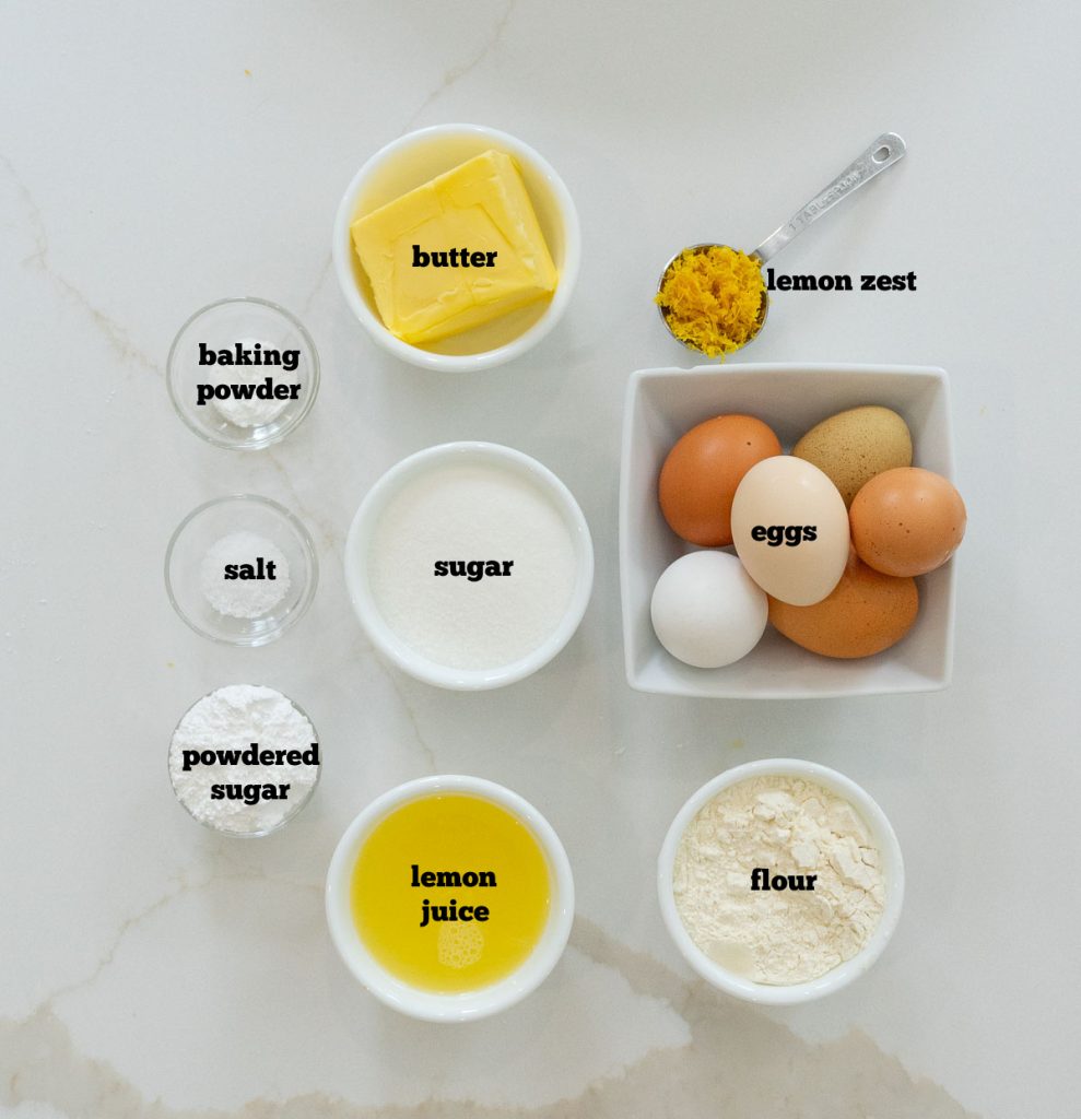 lemon bar ingredients on a white marble background