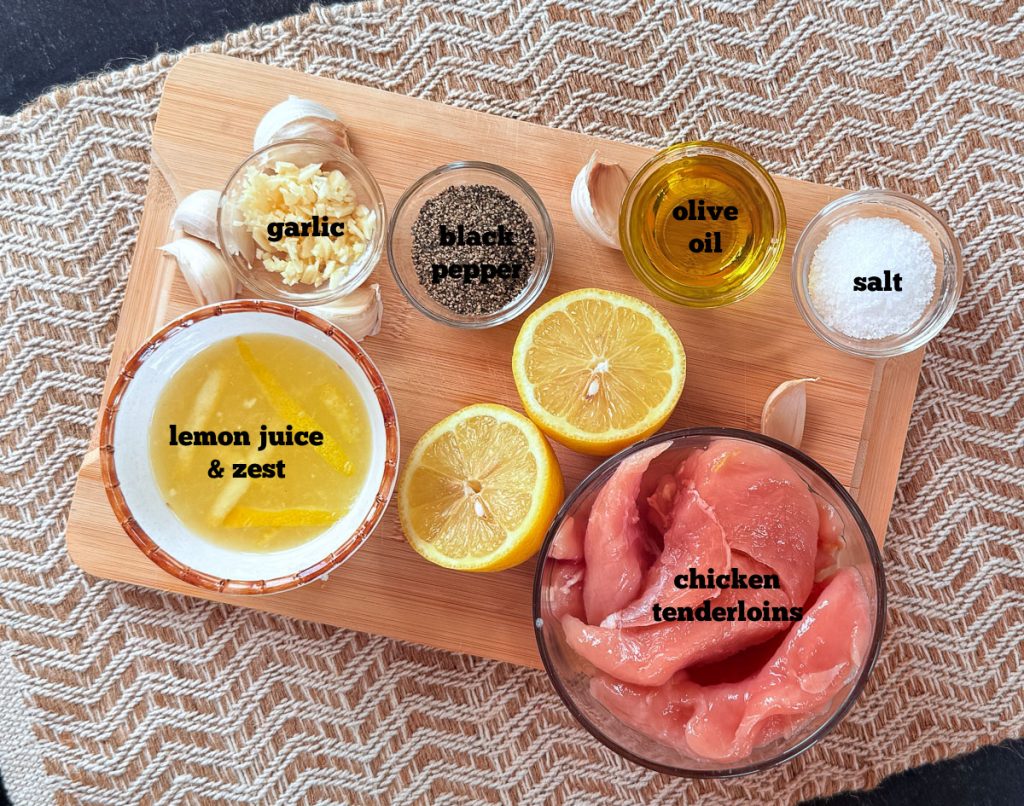lemon pepper chicken tender ingredients on a wood cutting board