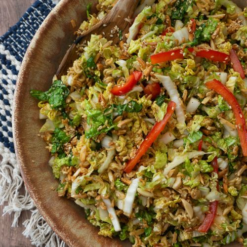 Ramen Noodle Napa Cabbage Salad in a brown salad bowl