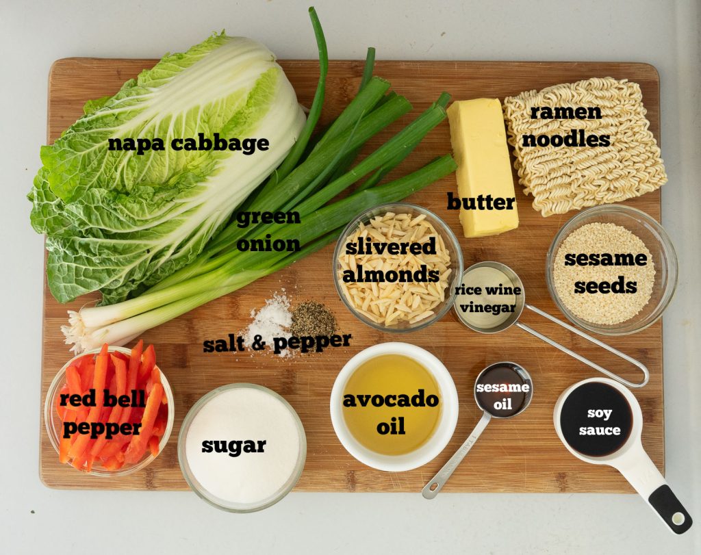ingredients for napa cabbage salad on a wood cutting board
