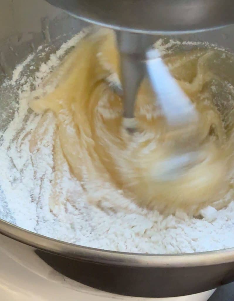 adding dry ingredients to wet ingredients