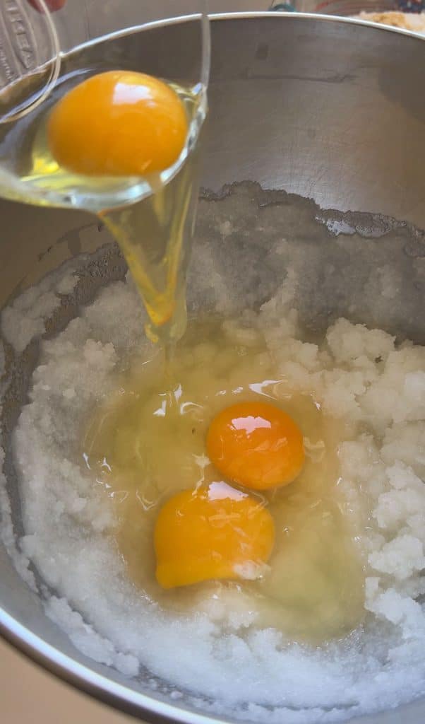 oil, sugar, and eggs in mixing bowl
