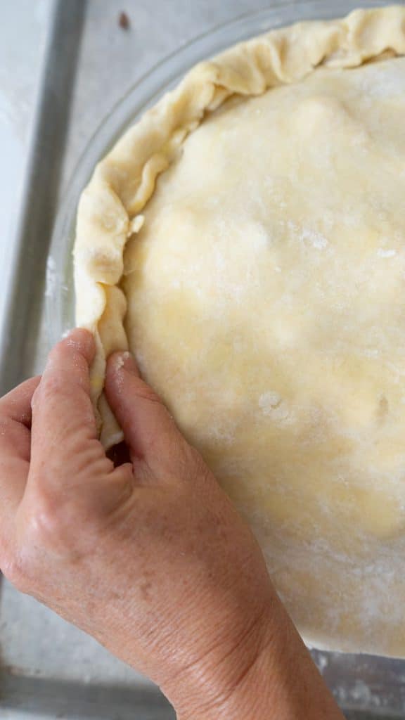 crimping top and bottom pie crust together 