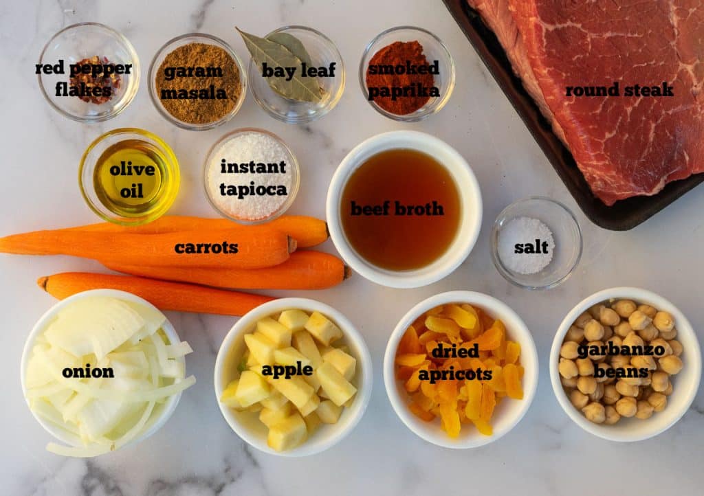 ingredients for stew on a white countertop