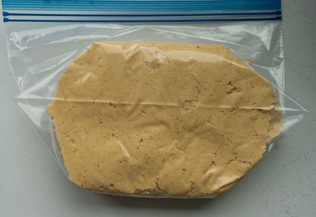brown sugar spice cookie dough in a zip loc plastic bag