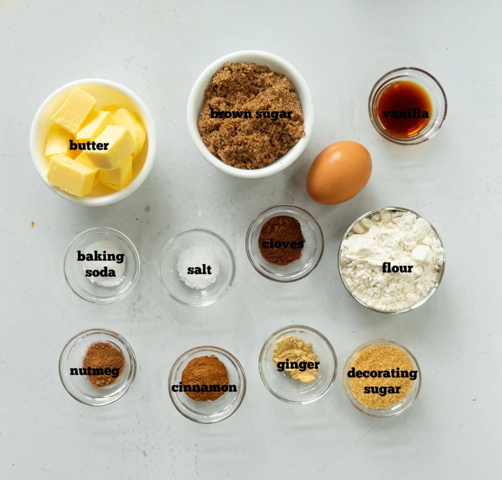 ingredients for brown sugar spice cookies on a white countertop