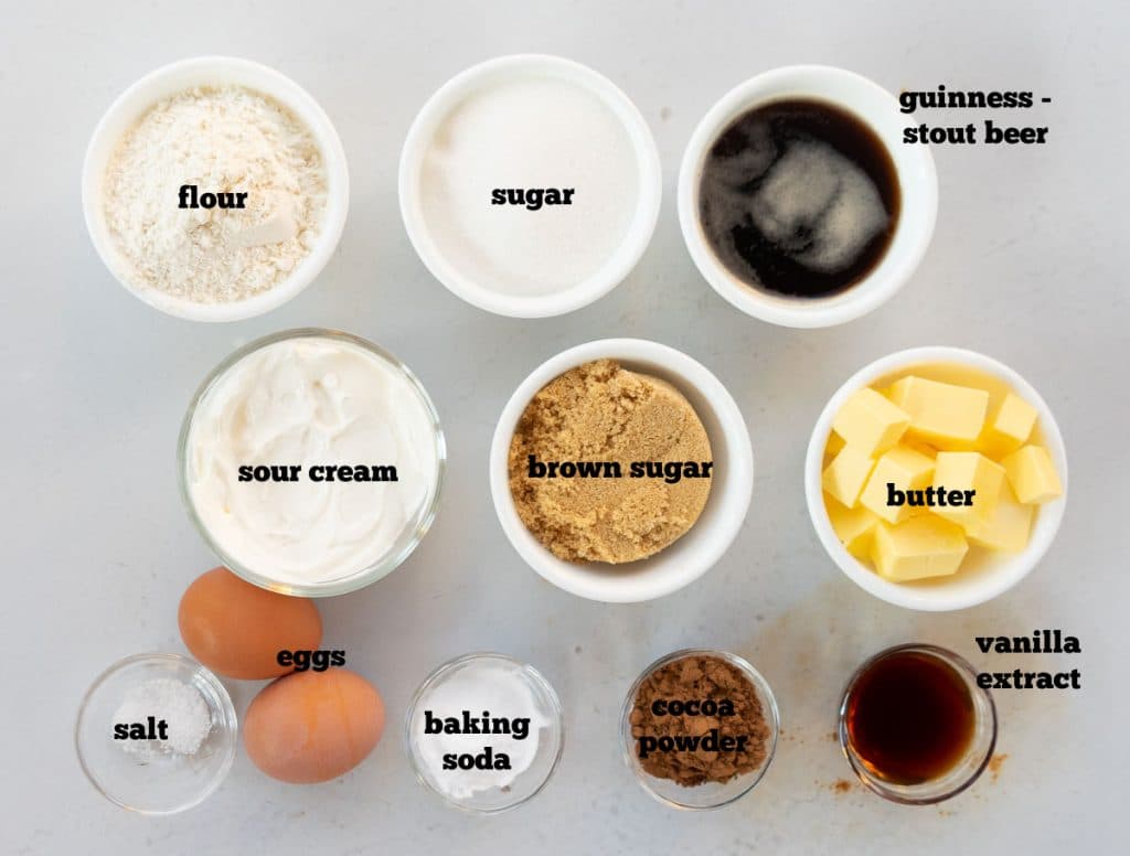ingredients for best dark chocolate guinness cake on a white countertop