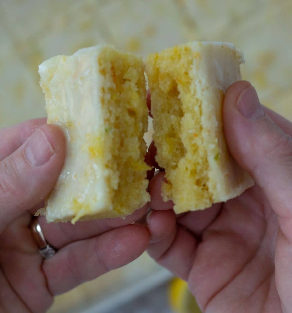 hands breaking in half a citrus bar