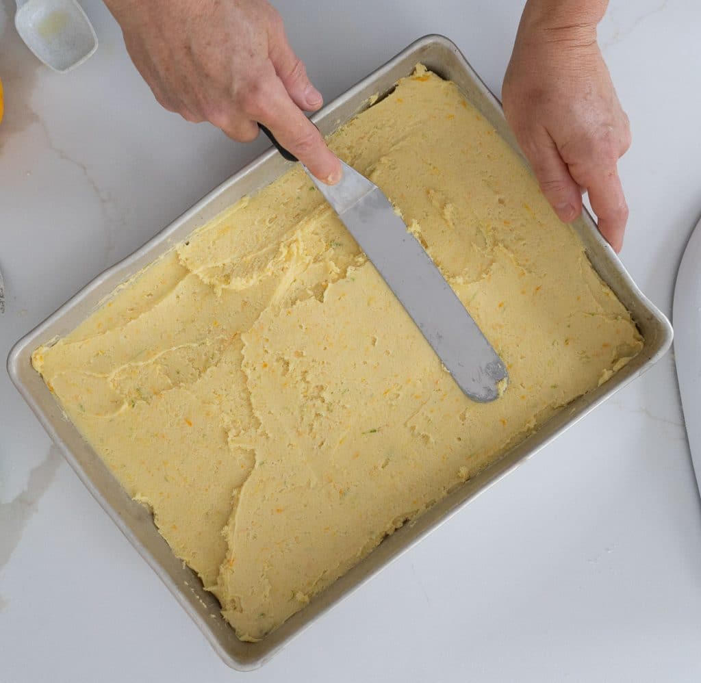 dough spread in 9x13 baking pan