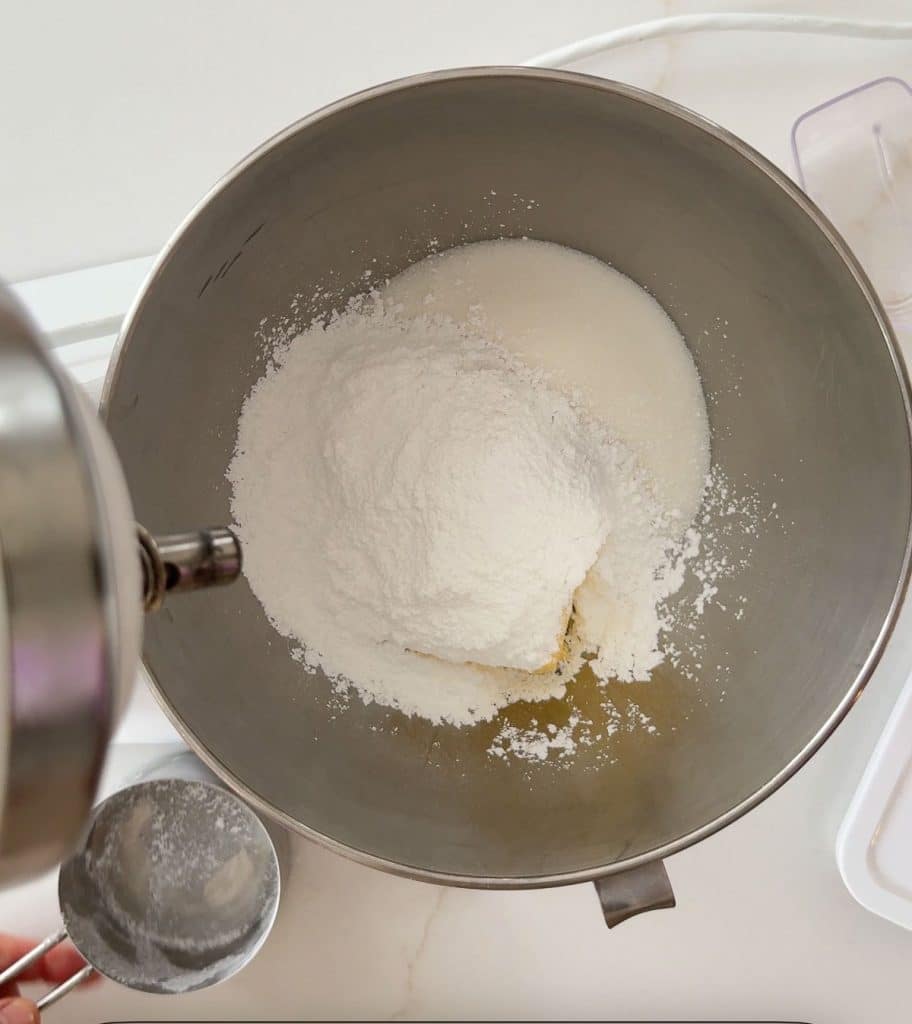 butter and sugars in bowl  of stand mixer