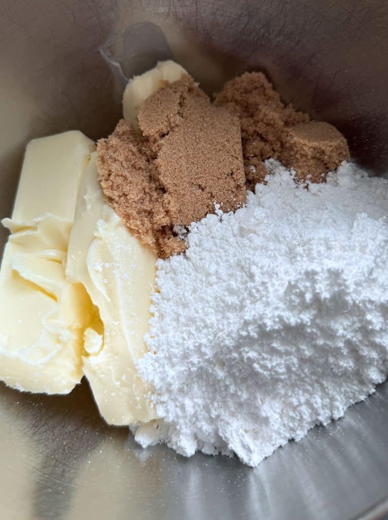 ingredients for salted caramel bar shortbread dough in stand mixer bowl. 