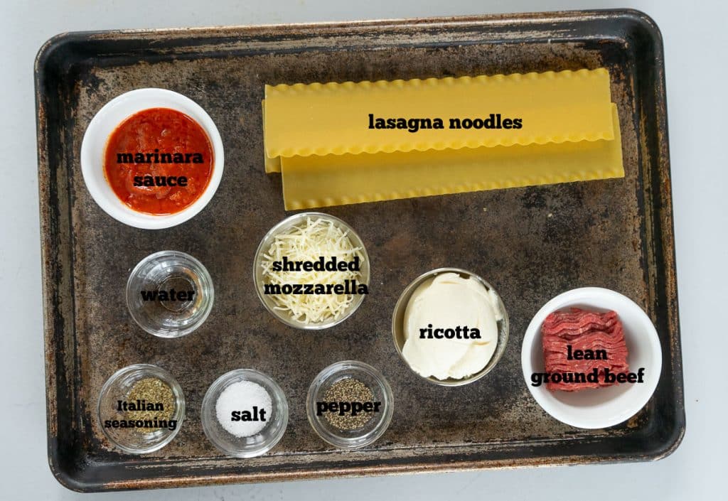 ingredients for skillet lasagna on a baking sheet
