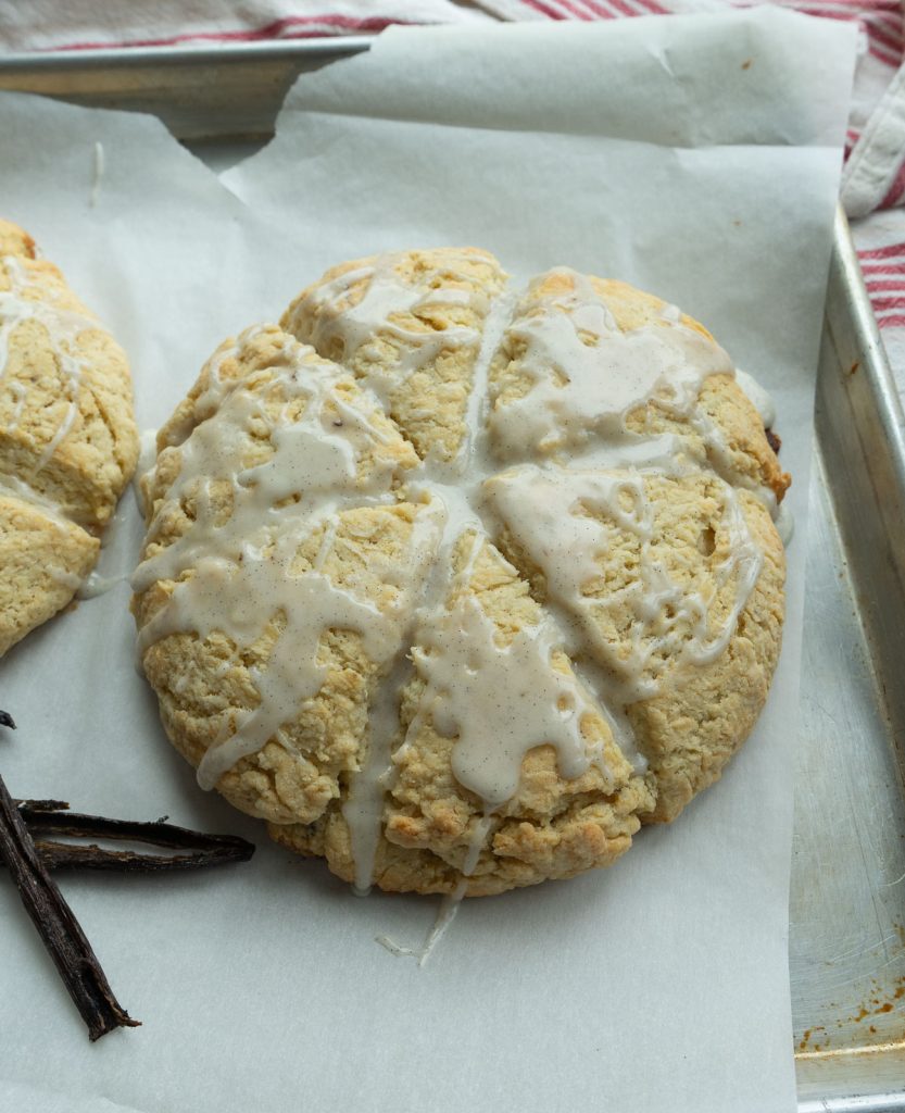vanilla bean scones on a baking sheet