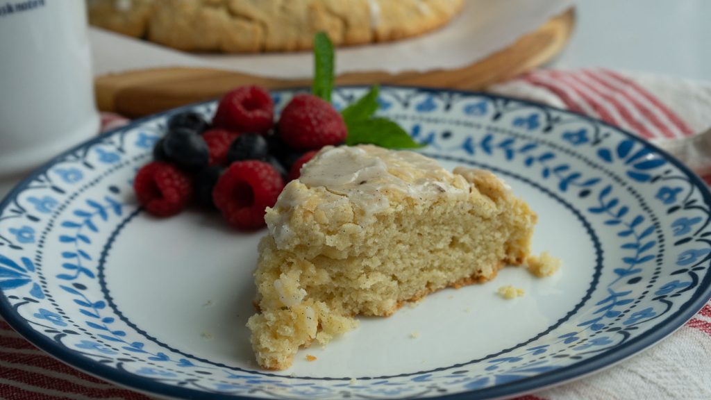 scone on a plate with berries
