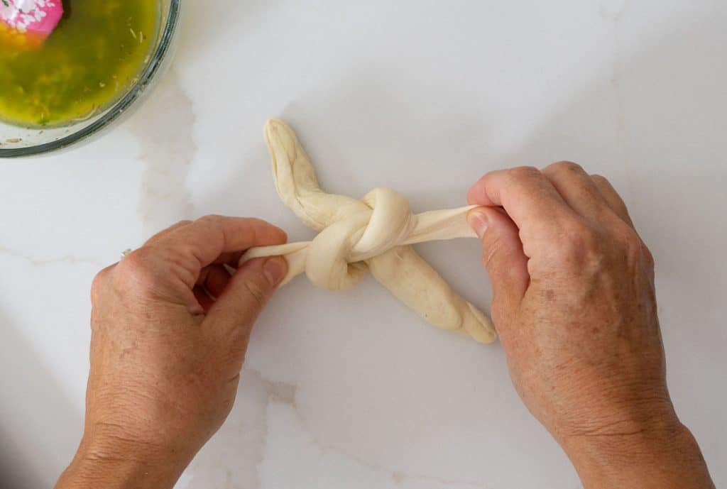 tying bread into a knot