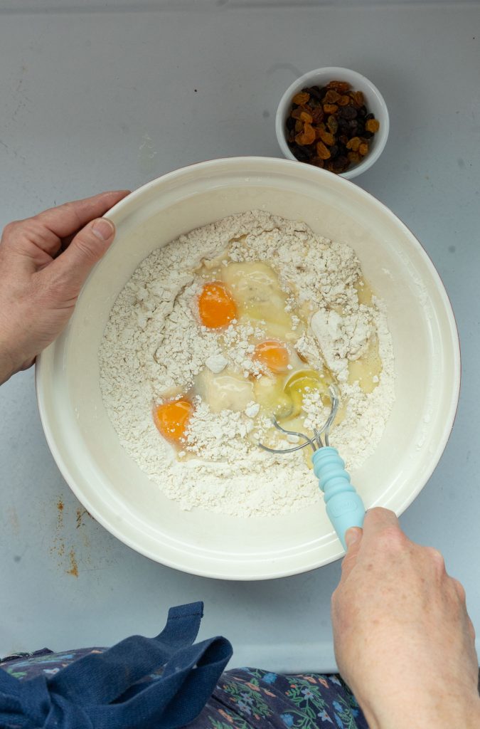 mixing wet and dry ingredients plus eggs