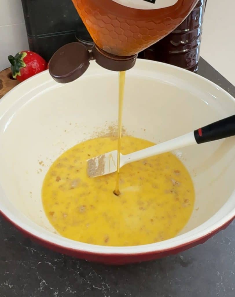 adding honey to the milk and melted butter