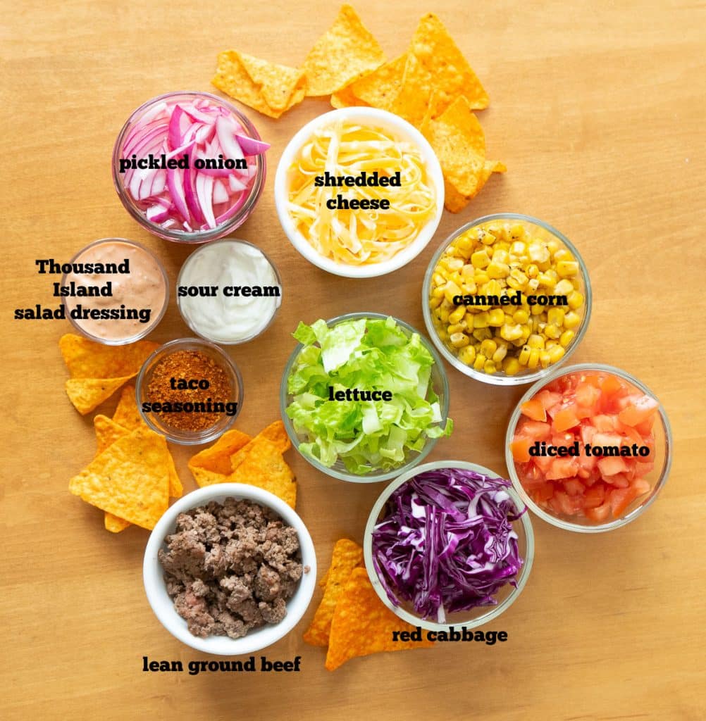 ingredients for Dorito taco salad on a wood table