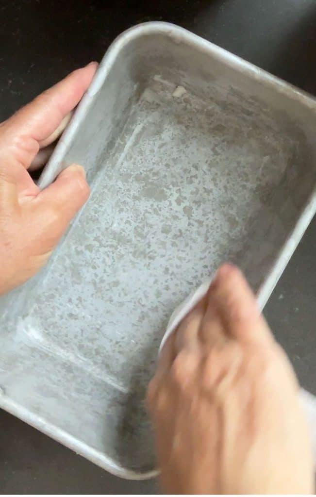 greasing loaf pan with shortening