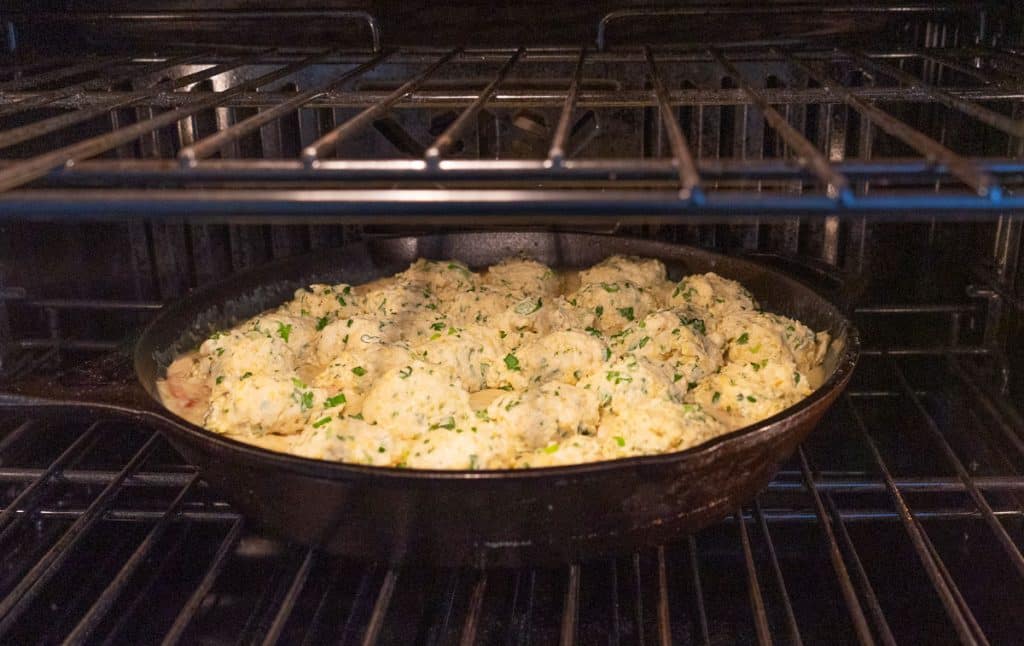 chicken and dumplings in a cast iron skillet in oven