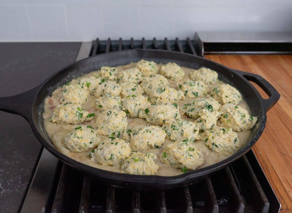 southwest chicken and dumplings before baking on stovetop in a cast iron skillet