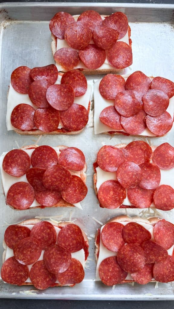 pepperoni on top of the cheese layer of the parmesan crusted pepperoni pizza grilled cheese